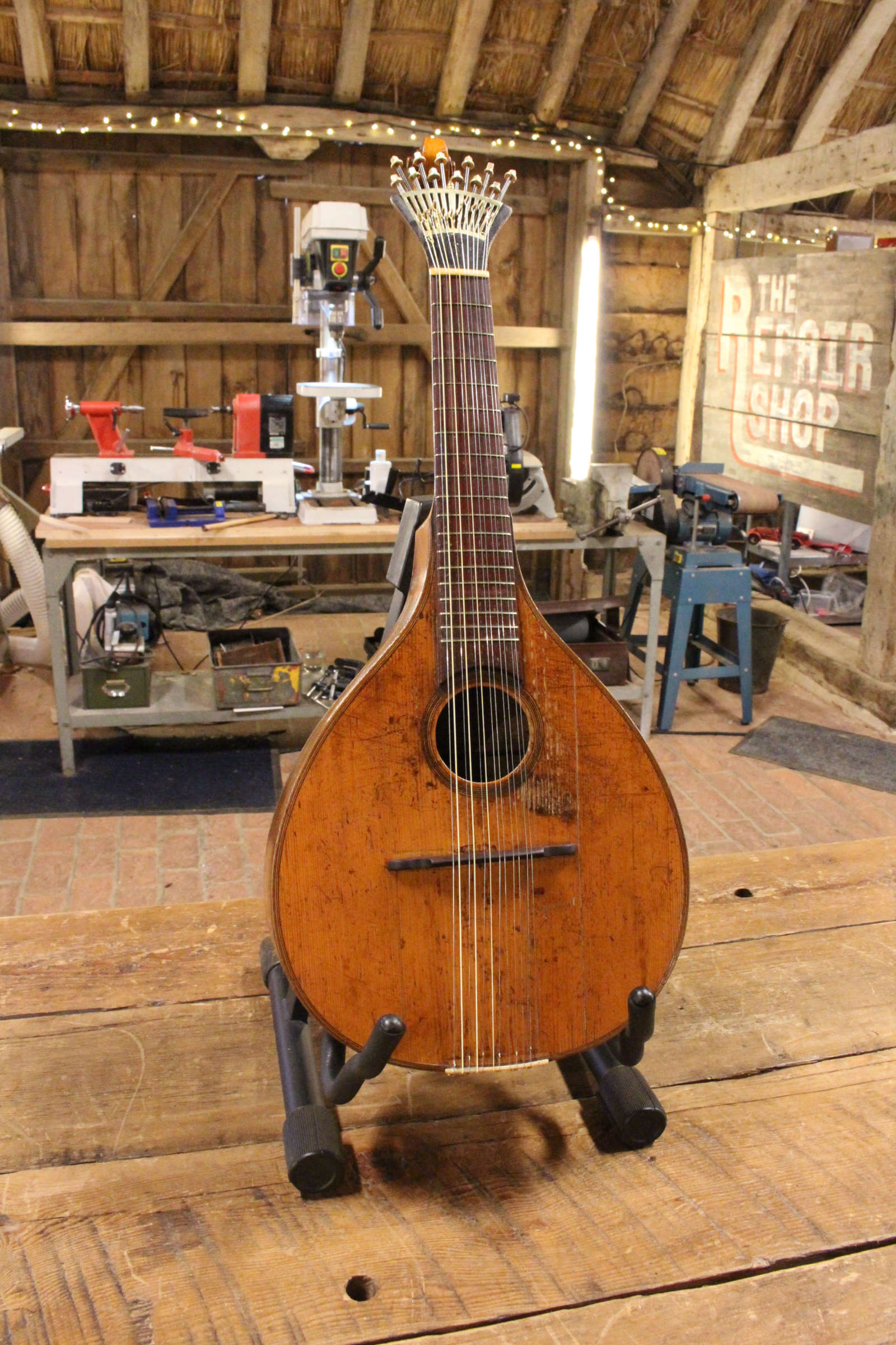 The Repair ShopRestoration of a Portuguese Guitar Flame Guitars