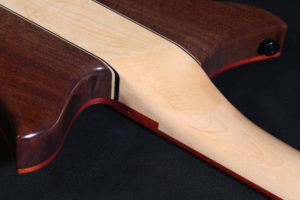 headless guitars carved neck