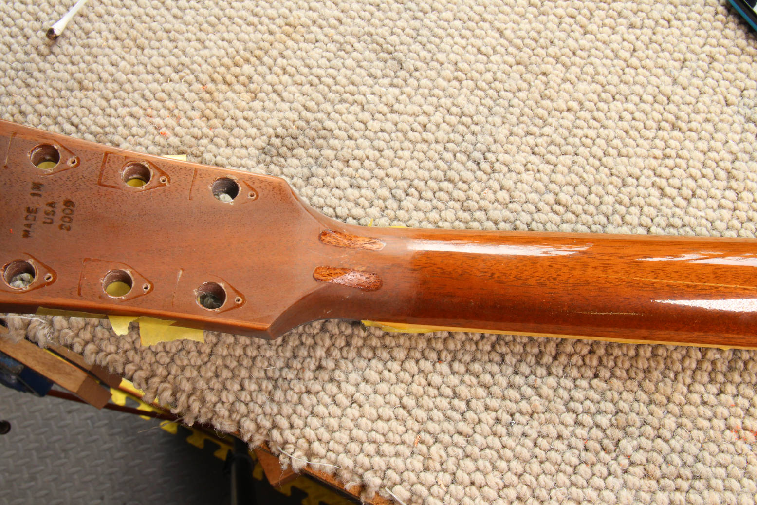 Repair of a broken Gibson Les Paul neck Flame Guitars